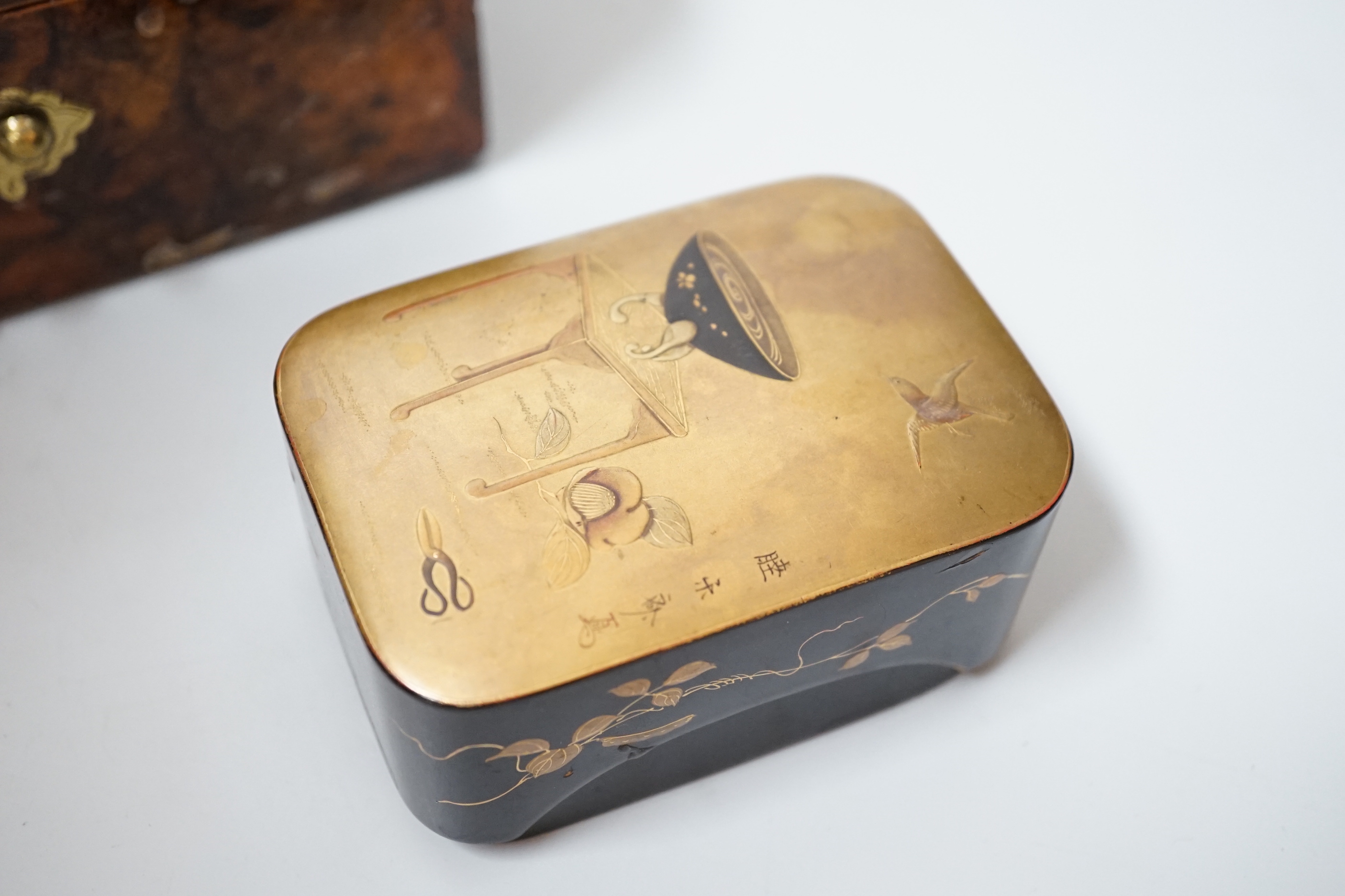 A walnut and brass-studded casket, 19.5cm wide, and a small lacquered box